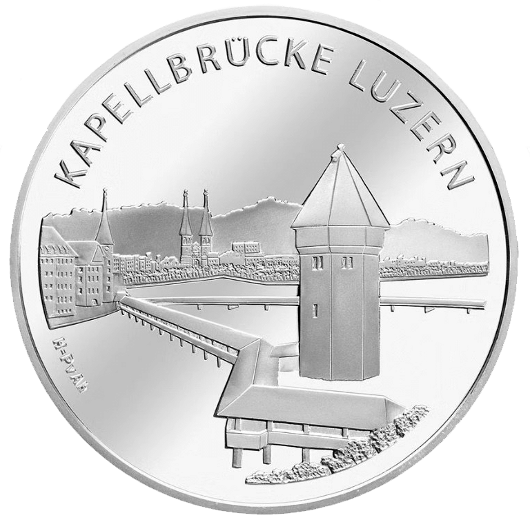 Silver coin illustrating the Chapel Bridge in Lucerne with towers over the river and the city skyline; inscribed Kapellbrücke Luzern.